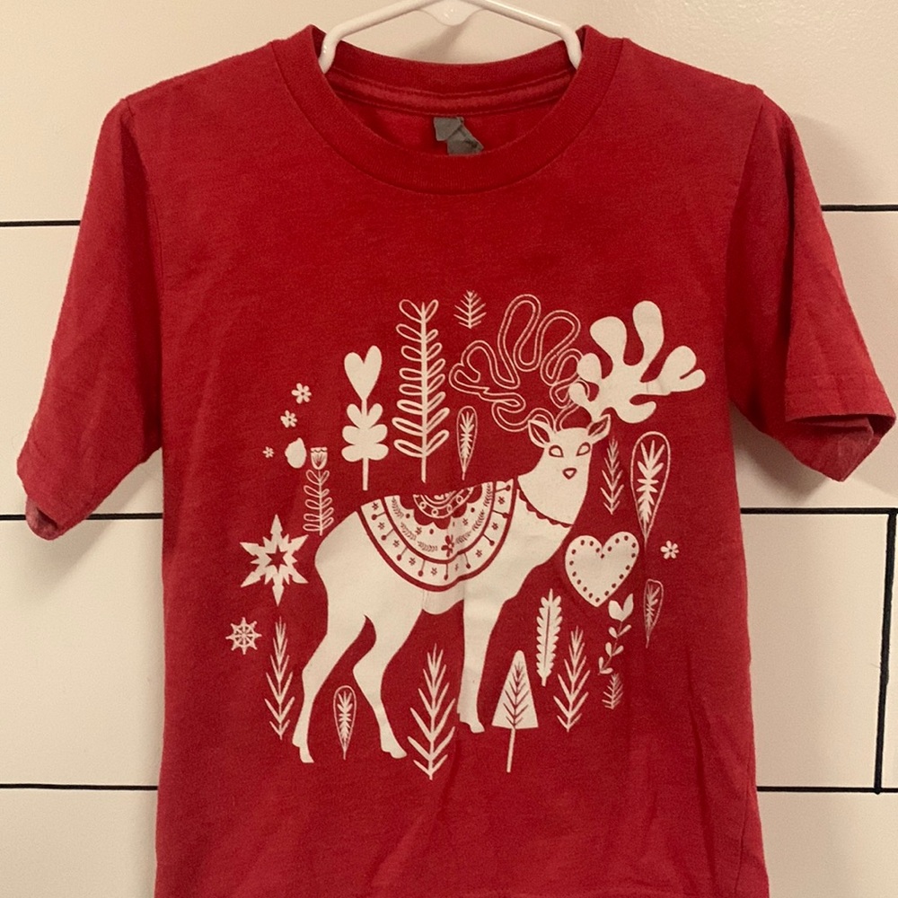 Kids shirt I’d say around a size 5t from
